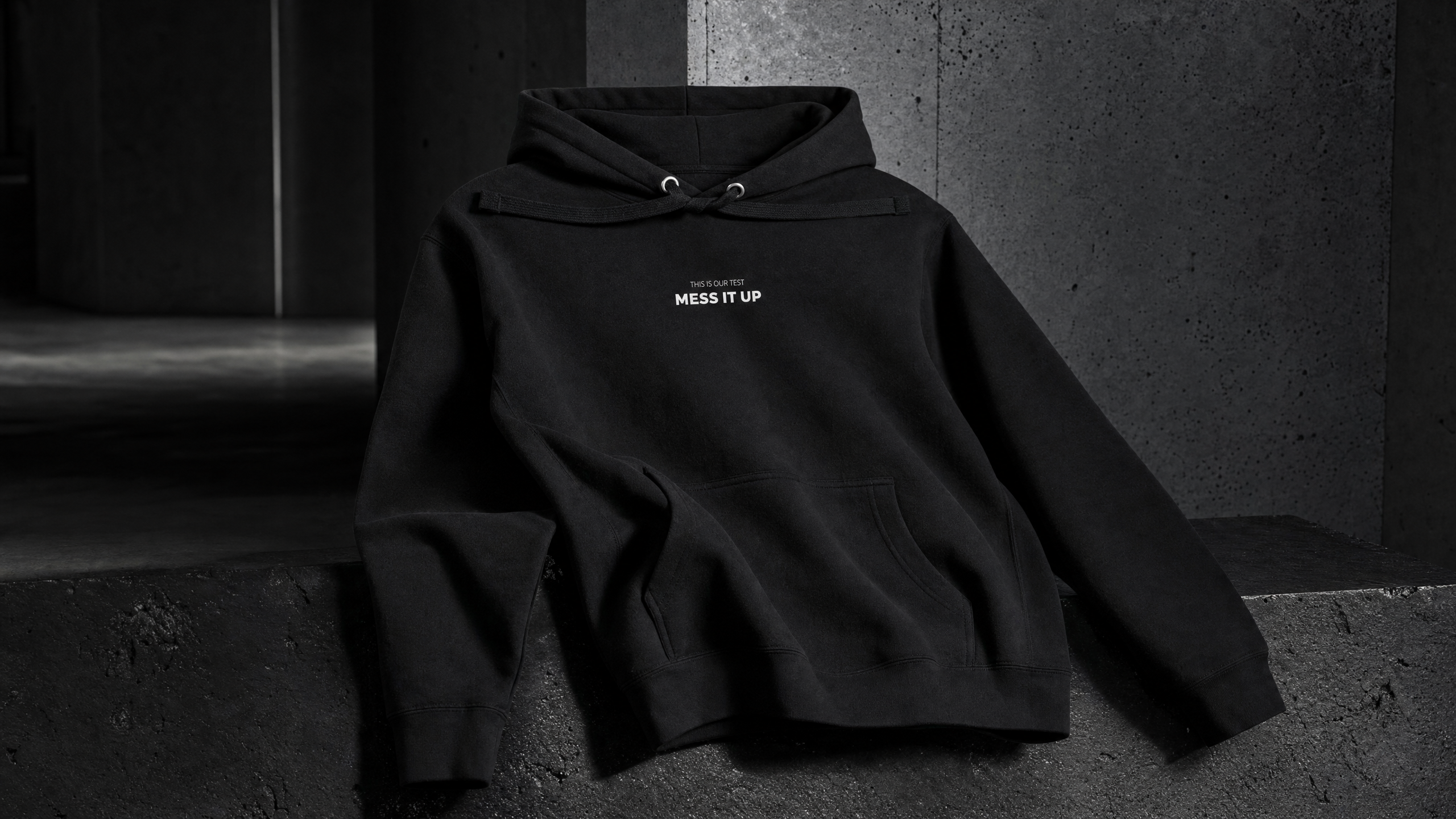 THIS IS OUR TEST. MESS IT UP. premium pullover hoodie — editorial campaign frame