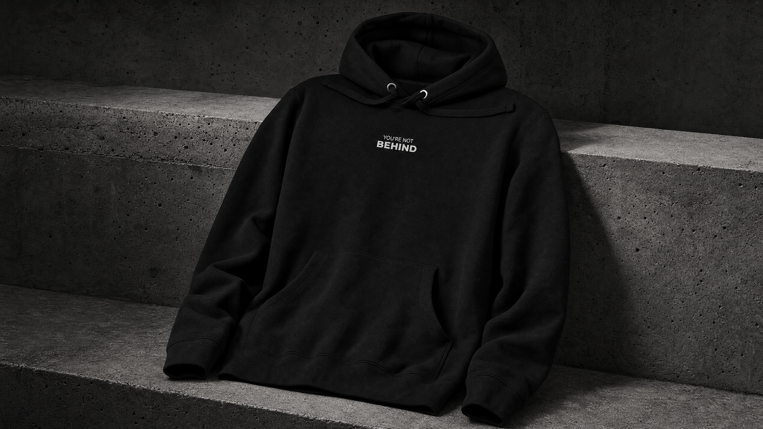 YOU’RE NOT BEHIND premium pullover hoodie — editorial campaign frame