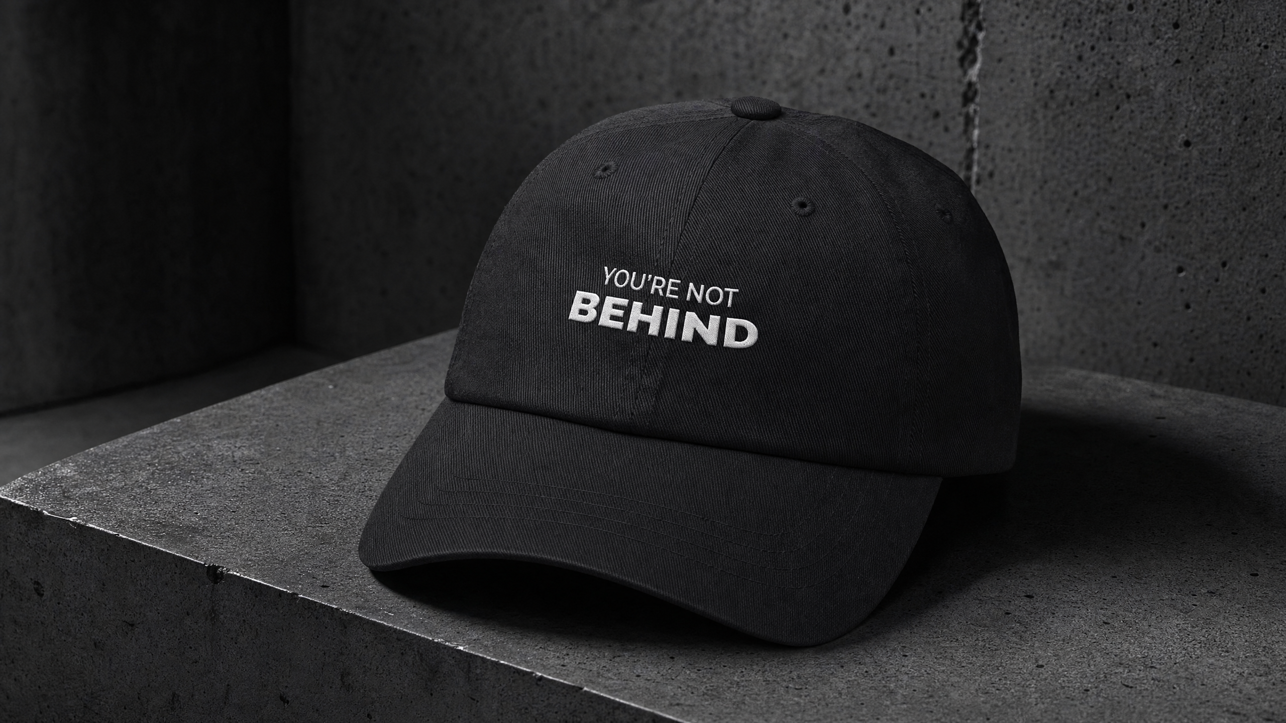 YOU’RE NOT BEHIND embroidered dad cap — editorial campaign frame
